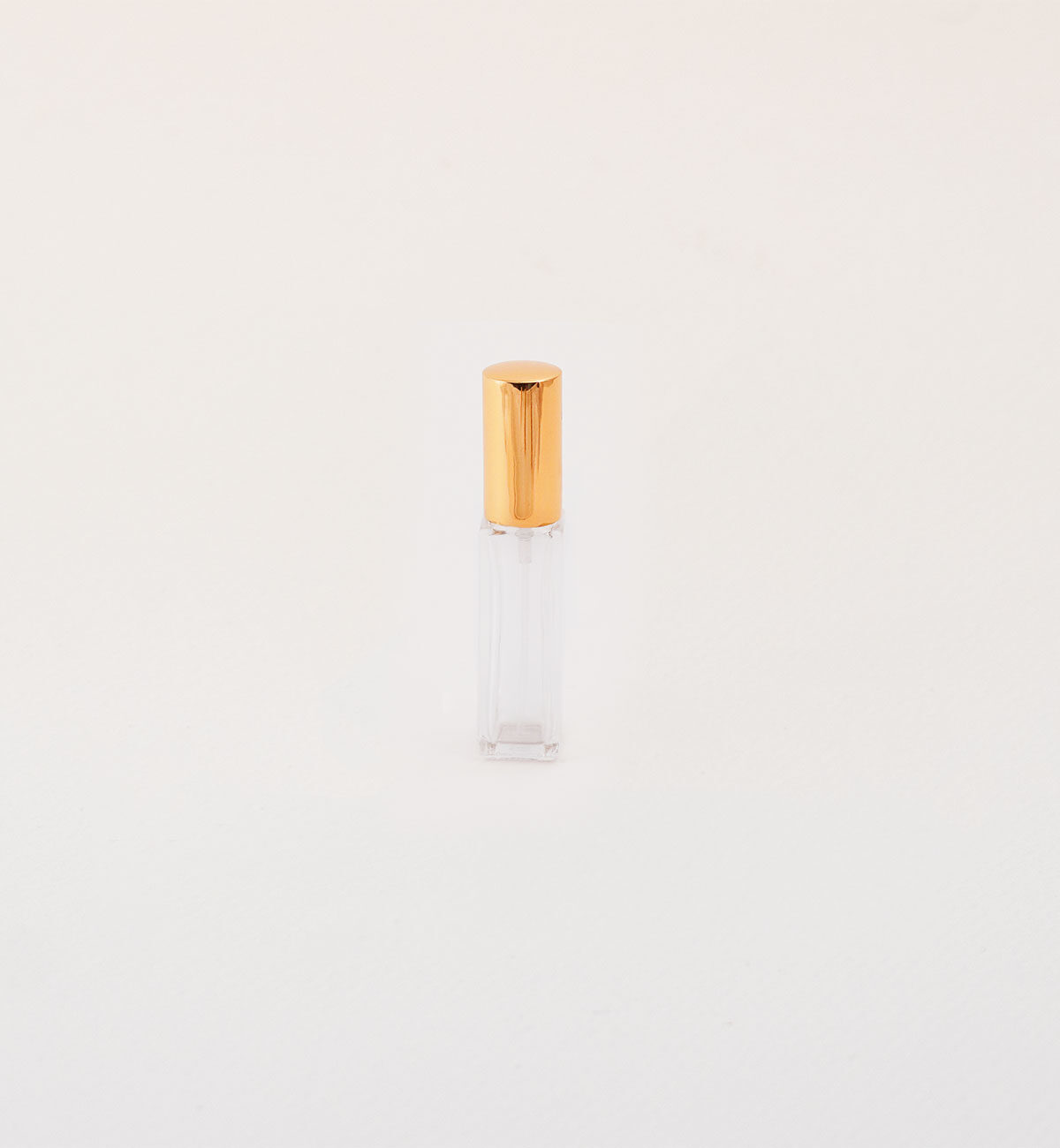 Bottiglia profumo da 10 ml con tappo color oro